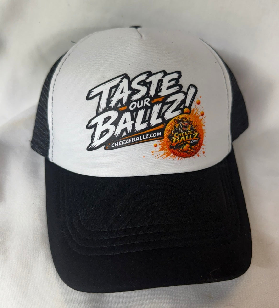 Cheezeballz Official “Taste Our Ballz!” Trucker Hat